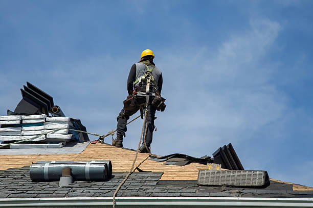 Professional Roofing technician working in Woodland, PA
